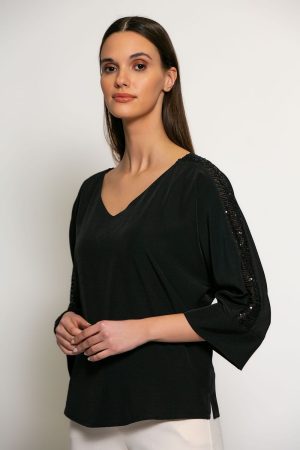 Blouse met glitterdetails