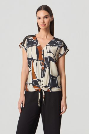 Bloesje met print en knoopje onderaan